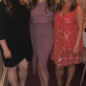 Pinkish dress tags state size 12 however it fits like a medium.